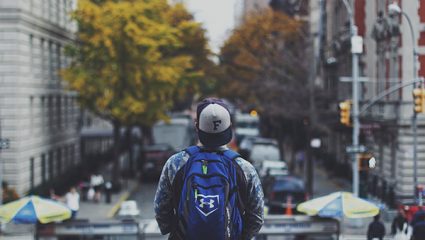 Adolescent with cityscape