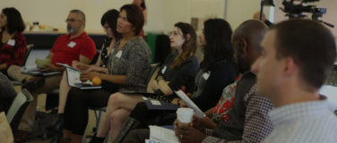 Workshop participants engaged and looking at the speaker.